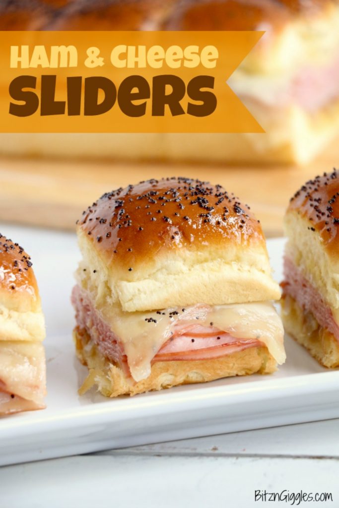 Ham and Cheese Sliders -Hawaiian rolls filled with ham, cheese, onions and a delicious mustard sauce, then brushed with butter. A great appetizer to feed a crowd!