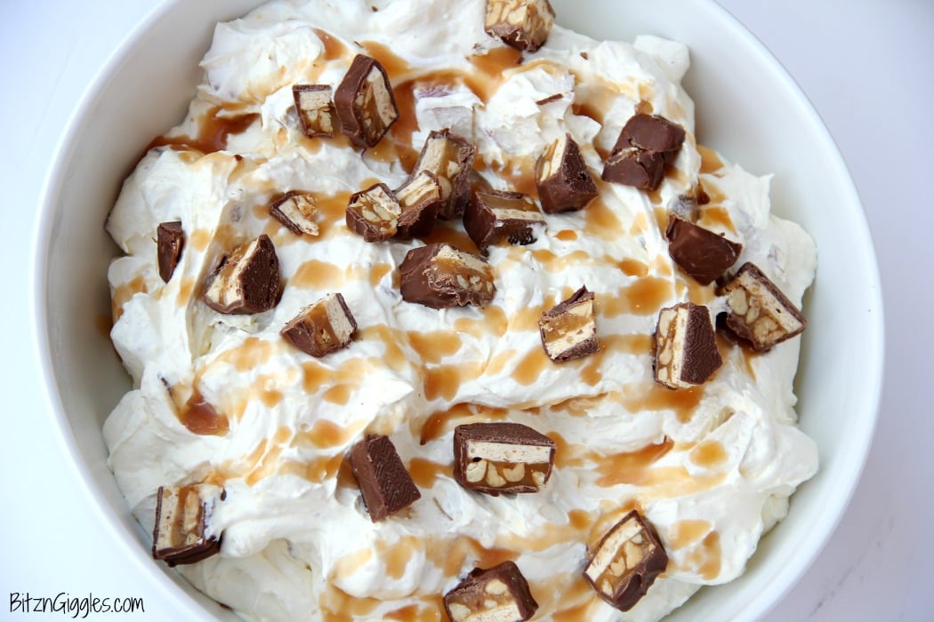 Snickers Caramel Apple Salad - a creamy, dreamy salad made with Snickers candy bars, pudding and whipped topping!