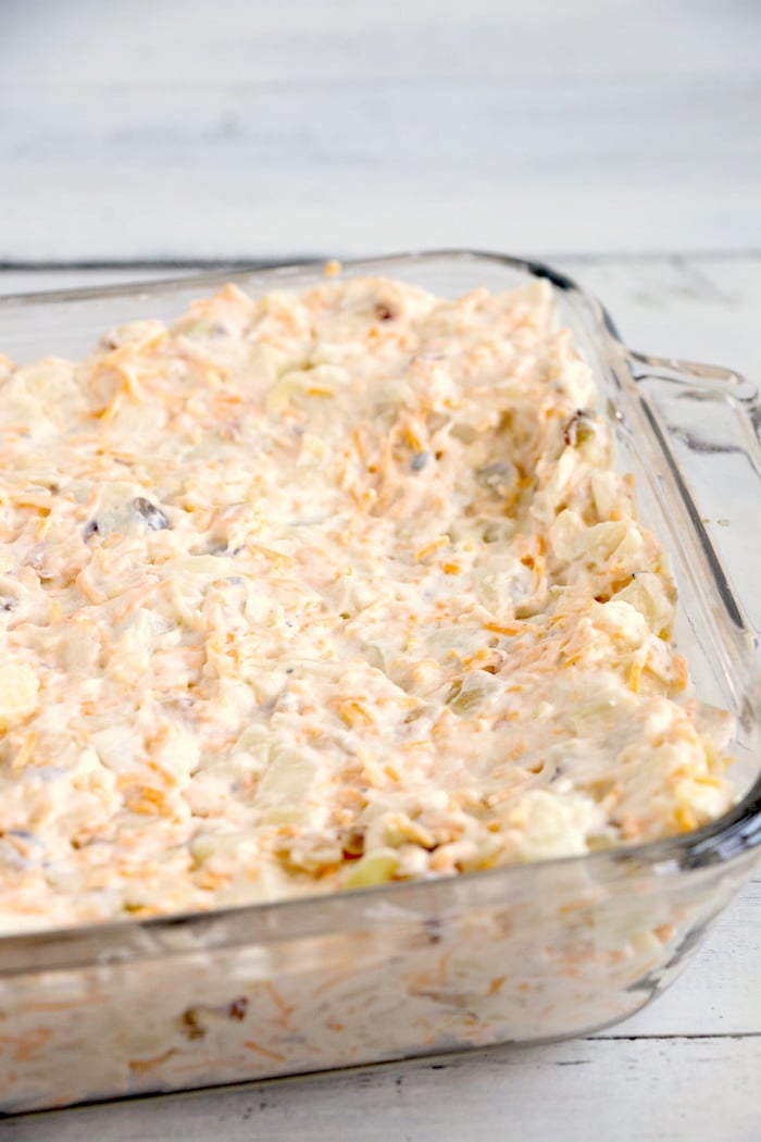 Cheesy Hashbrown Potatoes - Cheesy potato casserole topped with crunchy French fried onions! One of the best hash brown casserole recipes out there! 