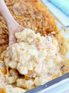 Cheesy Hashbrown Potatoes - Cheesy potato casserole topped with crunchy French fried onions! One of the best hash brown casserole recipes out there!