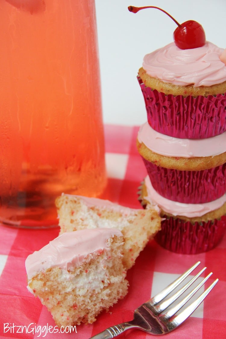 Shirley Temple Cupcakes - Made with Cherry Chip cake mix spiked with lemon-lime soda, filled with a marshmallowy fluff, topped with vanilla buttercream frosting and garnished with a cherry! WOW!