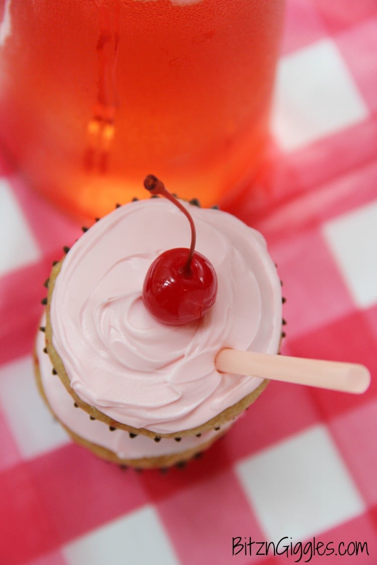 Shirley Temple Cupcakes - Made with Cherry Chip cake mix spiked with lemon-lime soda, filled with a marshmallowy fluff, topped with vanilla buttercream frosting and garnished with a cherry! WOW!