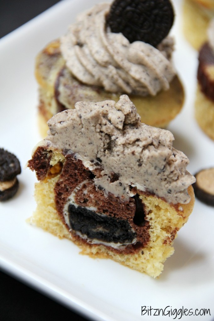 Peanut Butter Oreo and Cream Cupcakes, marble cupcakes with a surprise cream cheese and peanut butter Oreo center, topped with Oreo Peanut Butter & Cream frosting. 