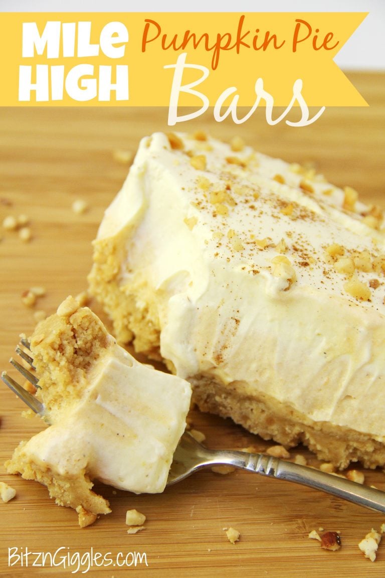 Mile High Pumpkin Pie Bars - Light, fluffy and creamy pumpkin and vanilla topping piled high on top of a golden Oreo crust and sprinkled with cinnamon and nut topping.- Bitz & Giggles