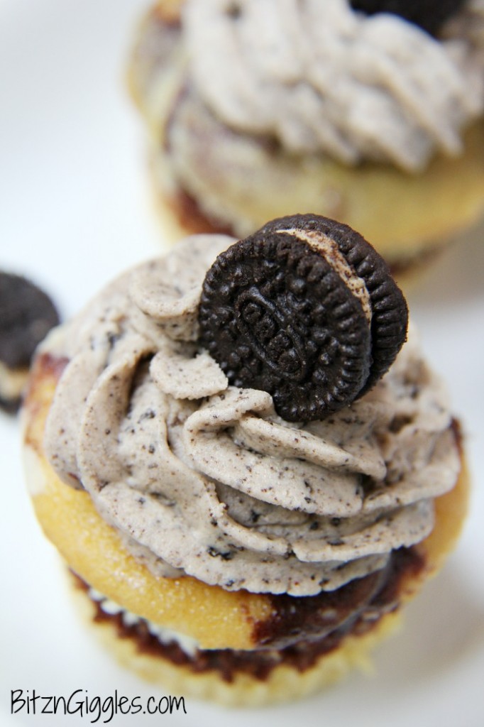 Peanut Butter Oreo and Cream Cupcakes, marble cupcakes with a surprise cream cheese and peanut butter Oreo center, topped with Oreo Peanut Butter & Cream frosting. 