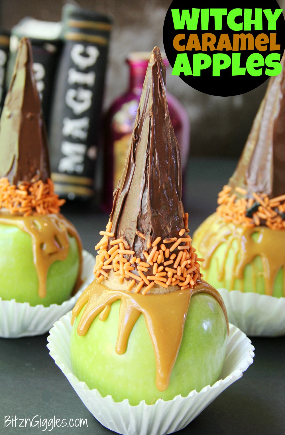 Witchy Caramel Apples - Crisp and tart Granny Smith apples covered with melted caramel and topped with a chocolate covered sugar cone garnished with some Halloween-themed sprinkles. 
