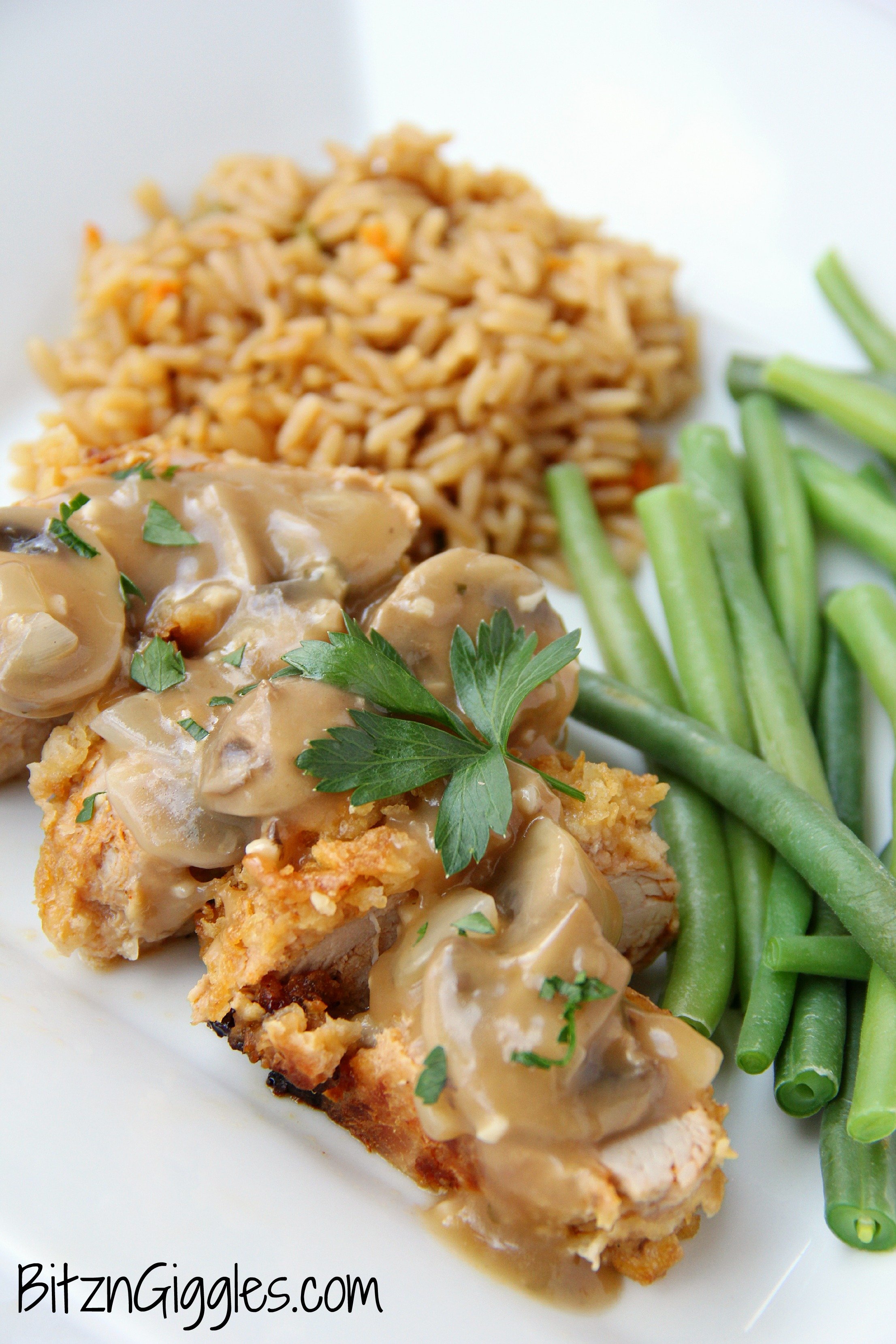 Onion-Crusted Pork Tenderloin - A mouth-watering pork tenderloin encrusted in French fried onions and drizzled with golden mushroom sauce.