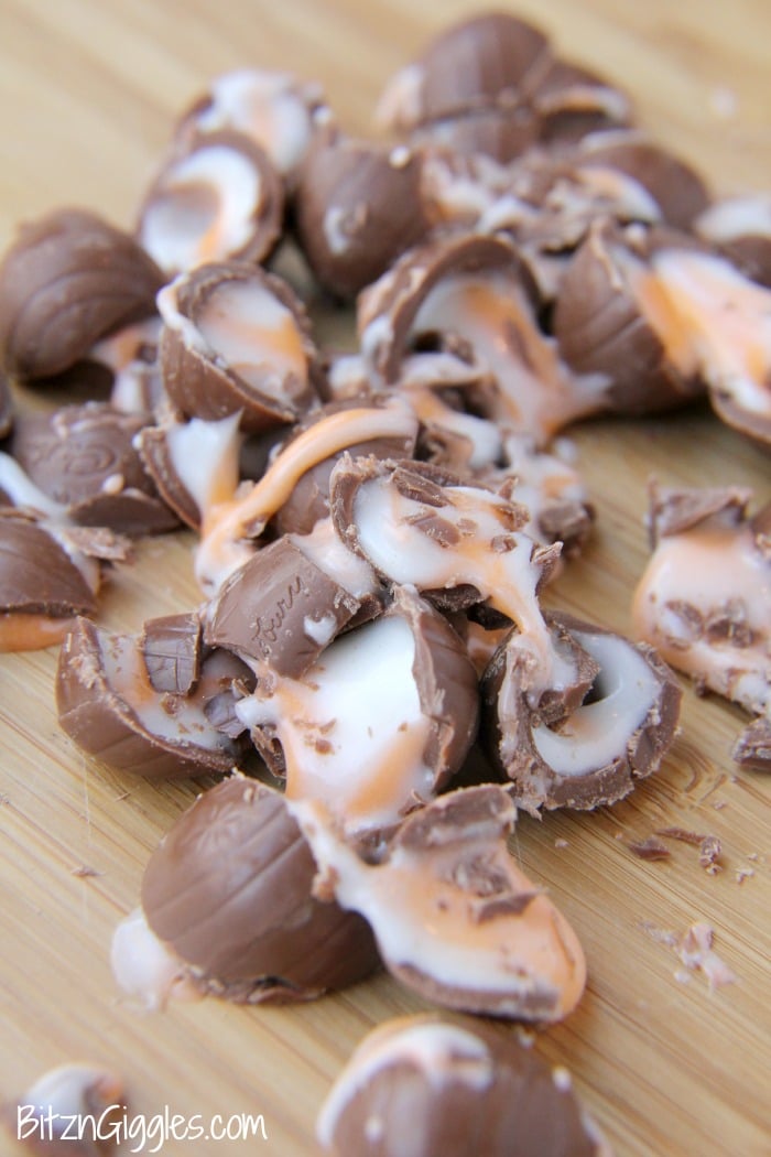 Cadbury Creme Egg Dip - A sweet and creamy marshmallow dip filled with bits of chocolate and swirled with white and yellow fondant filling from decadent Cadbury Creme Eggs.