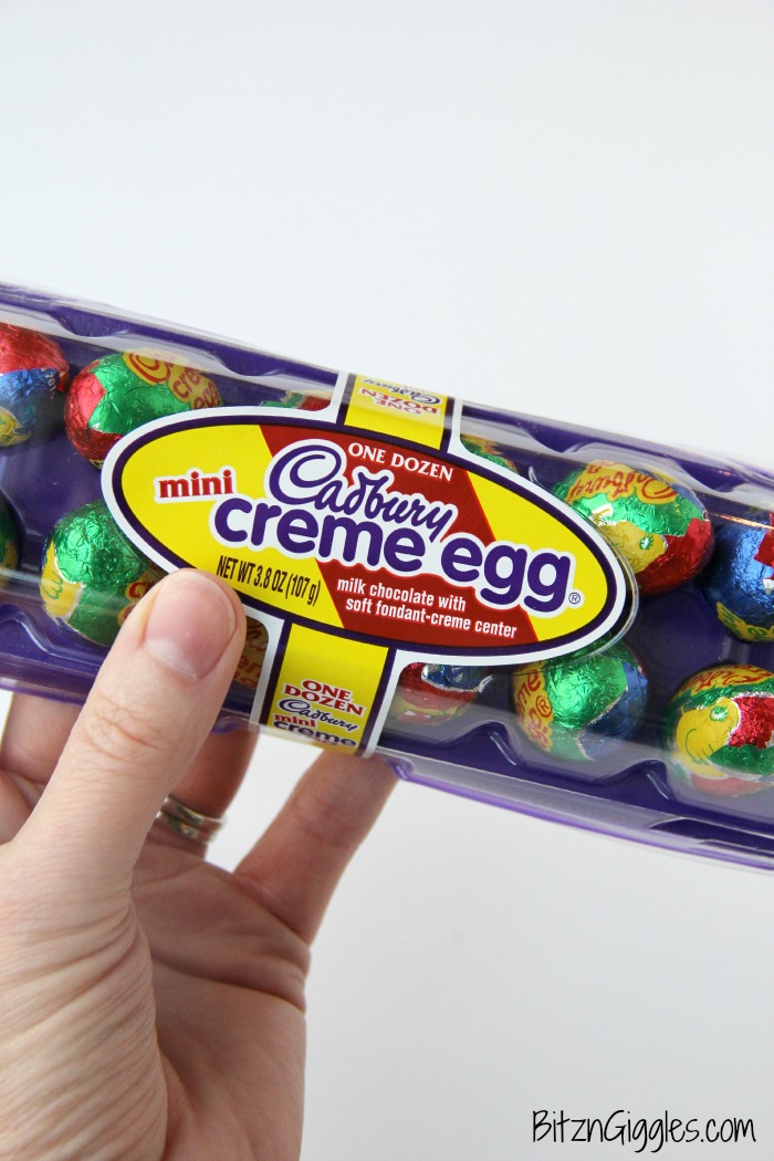 Cadbury Creme Egg Dip - A sweet and creamy marshmallow dip filled with bits of chocolate and swirled with white and yellow fondant filling from decadent Cadbury Creme Eggs.