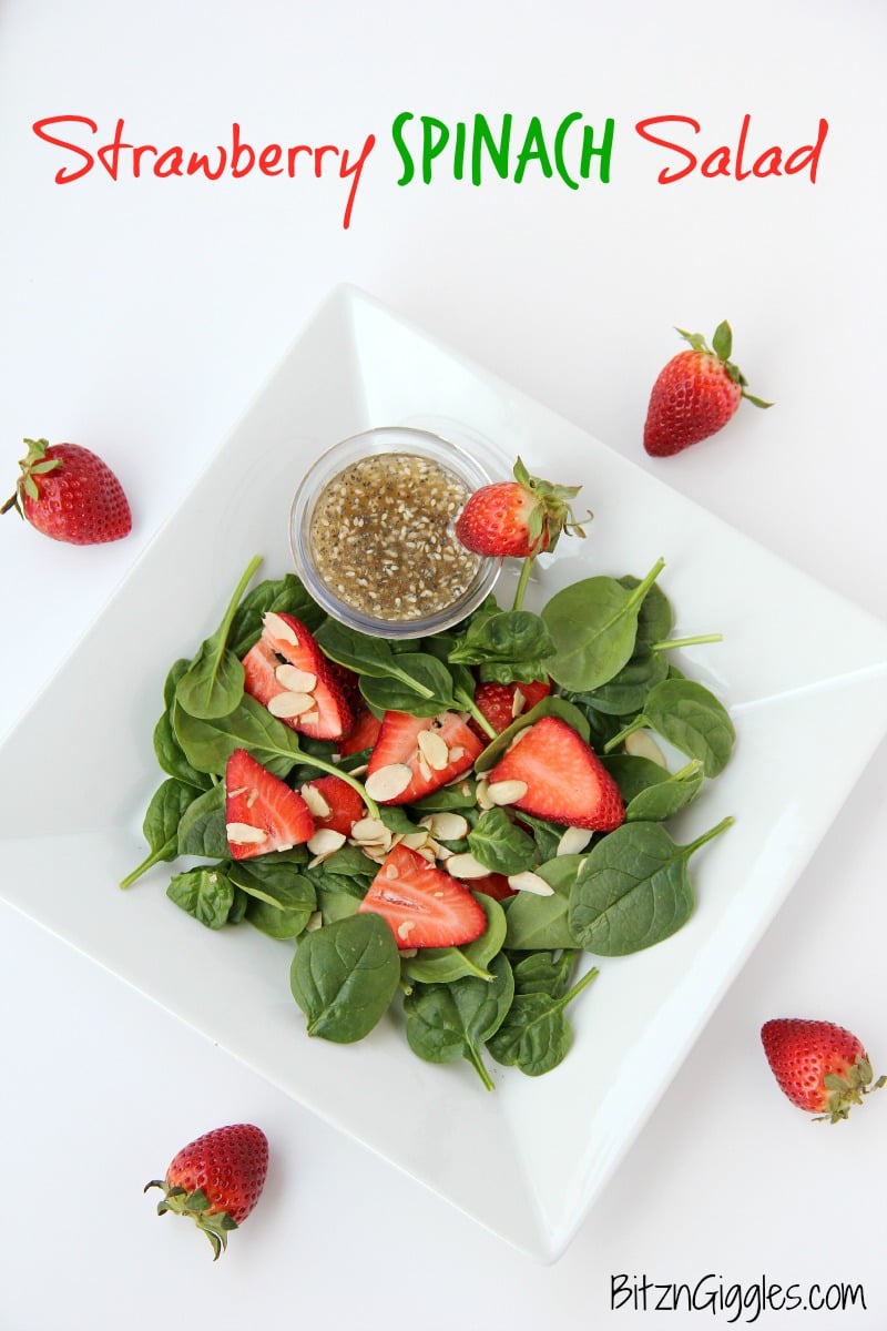 Strawberry Spinach Salad - A delicious, sweet salad with fresh strawberries, spinach and an almond crunch.