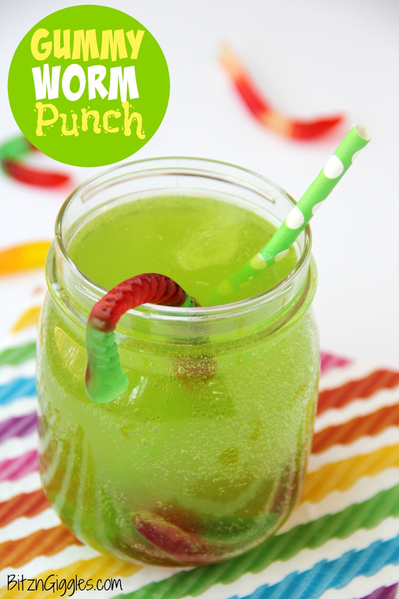 Gummy Worm Punch - Kids will love sipping on this drink in the summer! Great idea for birthday parties, St. Patrick's Day and Halloween, too! Gummy worms are frozen in a punch mixture and emerge from the ice as the drink is enjoyed! So much fun!