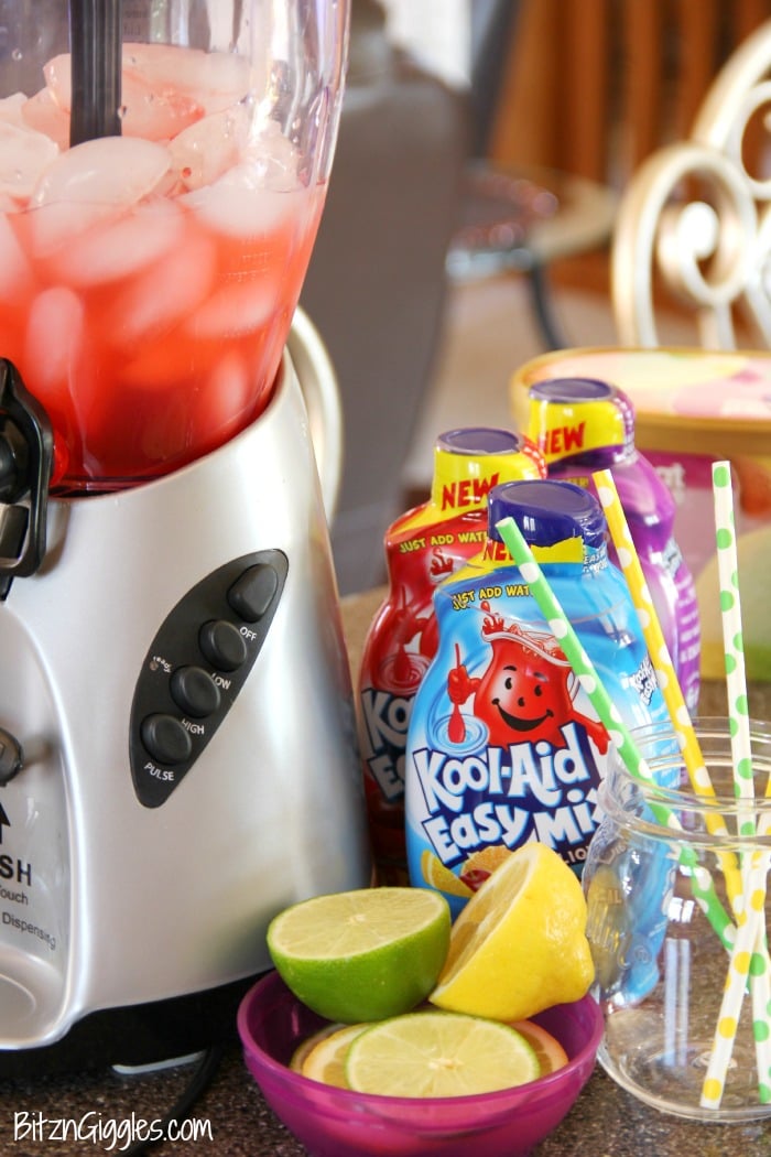 Kool-Aid Sherbet Slushie - A refreshing Kool-Aid slushie topped off with a creamy scoop of rainbow sherbet!