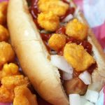 A family favorite with Wisconsin charm! Chopped onions, pickles, sauerkraut and cheese curds make this dog irresistible!