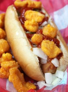 A family favorite with Wisconsin charm! Chopped onions, pickles, sauerkraut and cheese curds make this dog irresistible!
