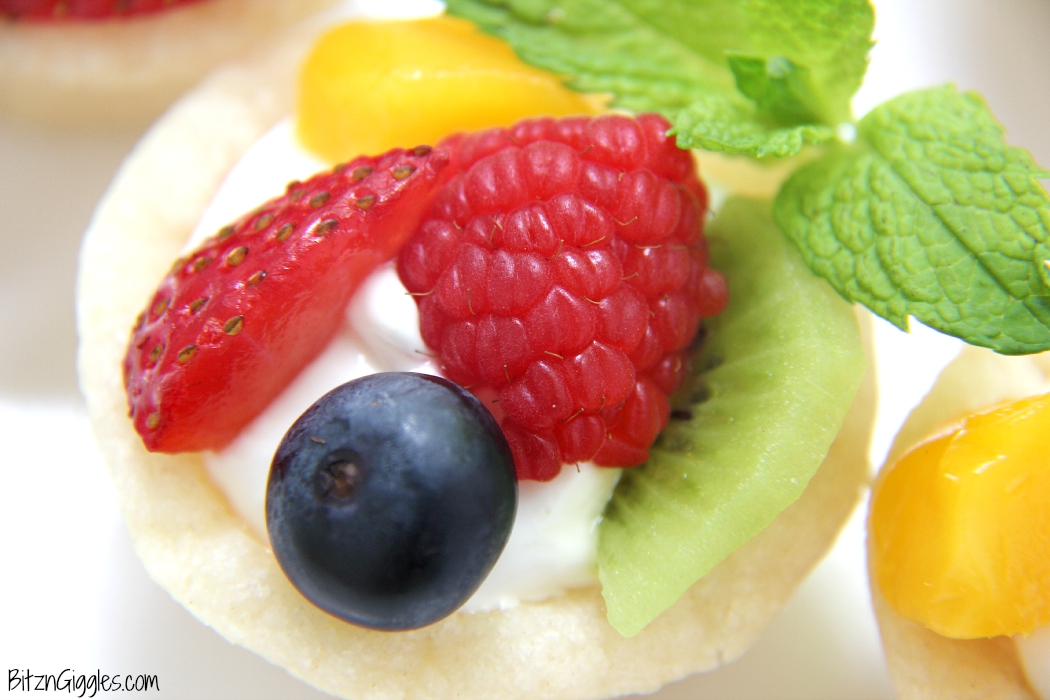 Sugar Cookie Fruit Cups - A bite-sized sugar cookie cup topped with fresh fruit, perfect for parties and gatherings!