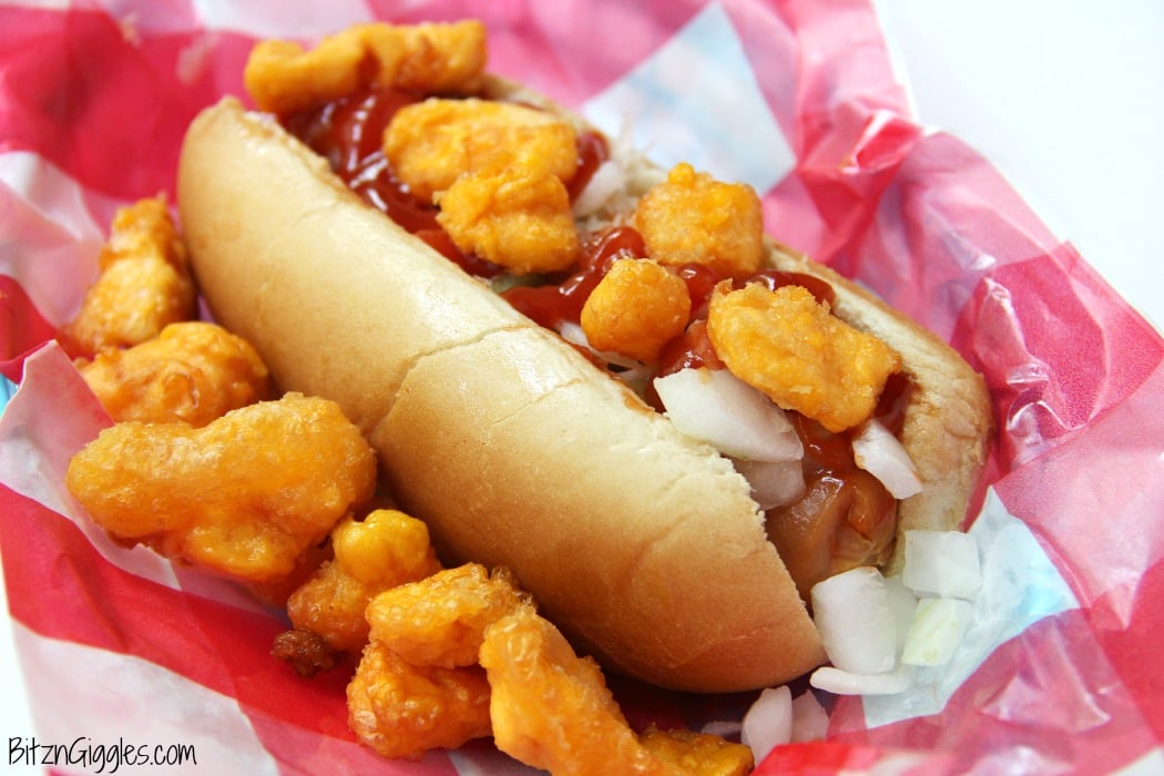 Cheese Curd Dogs - AA family favorite with Wisconsin charm! Chopped onions, pickles, sauerkraut and cheese curds make this dog irresistible!