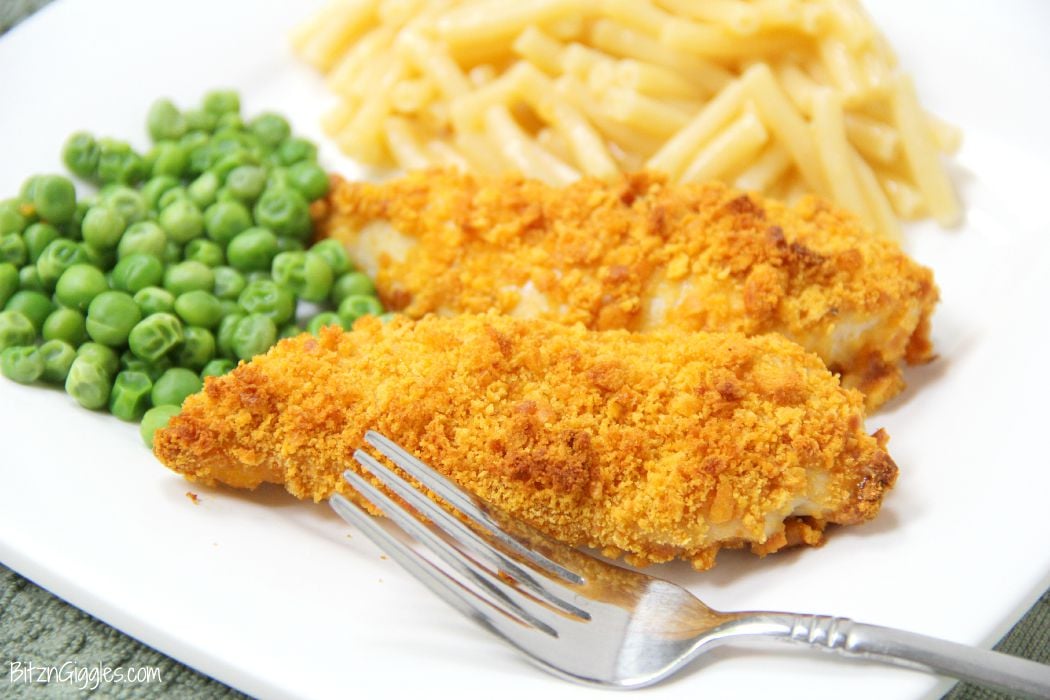 Homemade Cheddar Chicken Strips - Super juicy chicken strips with a crunchy cheddar cracker coating! A "kid food" favorite delicious enough for even adults!