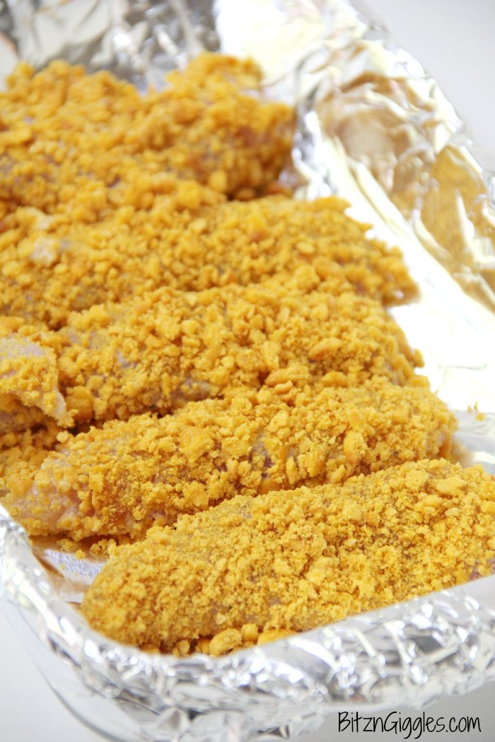 Homemade Cheddar Chicken Strips - Super juicy chicken strips with a crunchy cheddar cracker coating! A "kid food" favorite delicious enough for even adults!