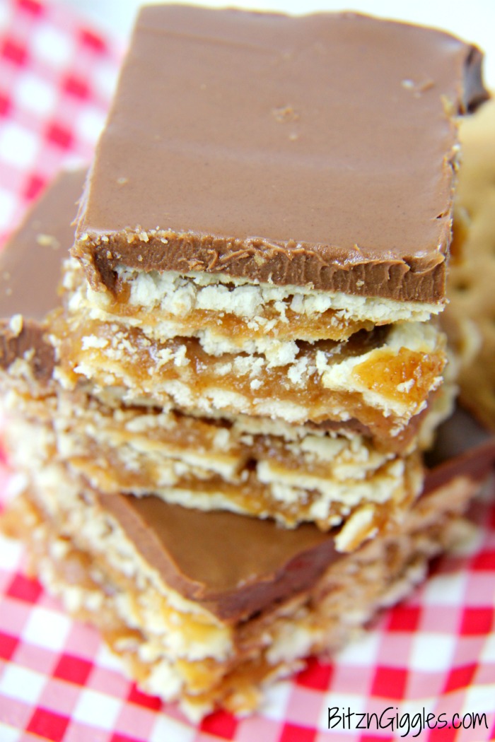 Peanut Butter Fudge Cracker Bars - A sweet and salty cracker layered dessert covered in rich peanut butter chocolate fudge!