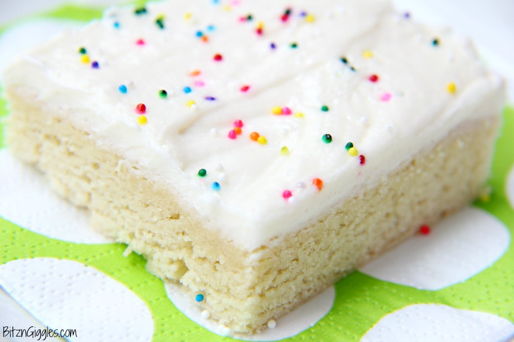 Sugar Cookie Cake Bars - Soft and chewy bars topped with decadent buttercream frosting and colorful sprinkles ~ perfect for a party and makes enough for a crowd!