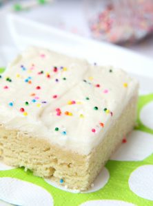 Sugar Cookie Cake Bars - Soft and chewy bars topped with decadent buttercream frosting and colorful sprinkles ~ perfect for a party and makes enough for a crowd!