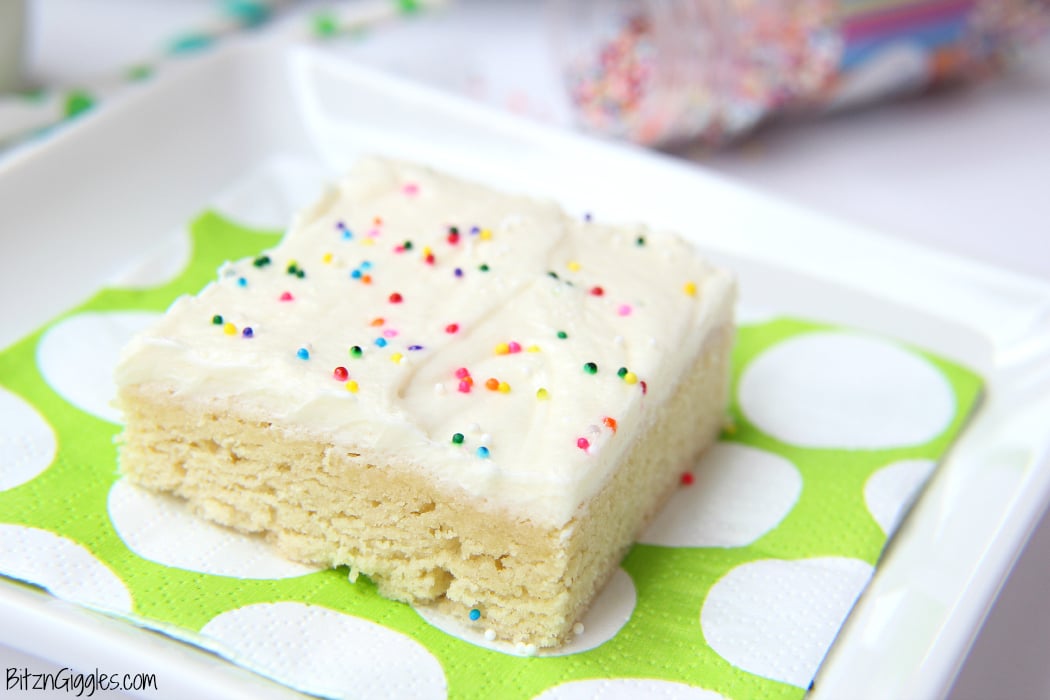 Sugar Cookie Cake Bars - Soft and chewy bars topped with decadent buttercream frosting and colorful sprinkles ~ perfect for a party and makes enough for a crowd!