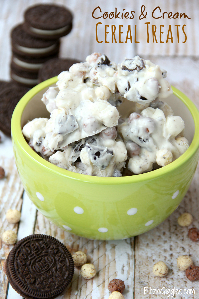Cookies and Cream Cereal Treats - White chocolate clusters of Oreo pieces, marshmallows and cookies and cream cereal! All you need is a microwave and a couple minutes to whip up these delicious and simple treats!