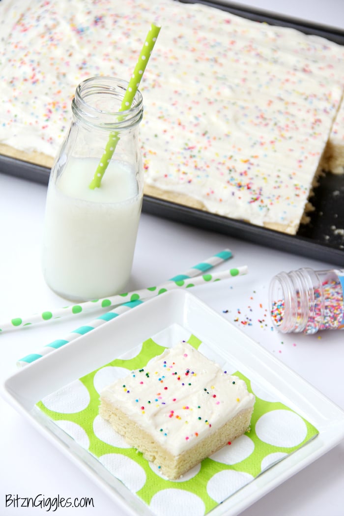 Sugar Cookie Cake Bars - Soft and chewy bars topped with decadent buttercream frosting and colorful sprinkles ~ perfect for a party and makes enough for a crowd!