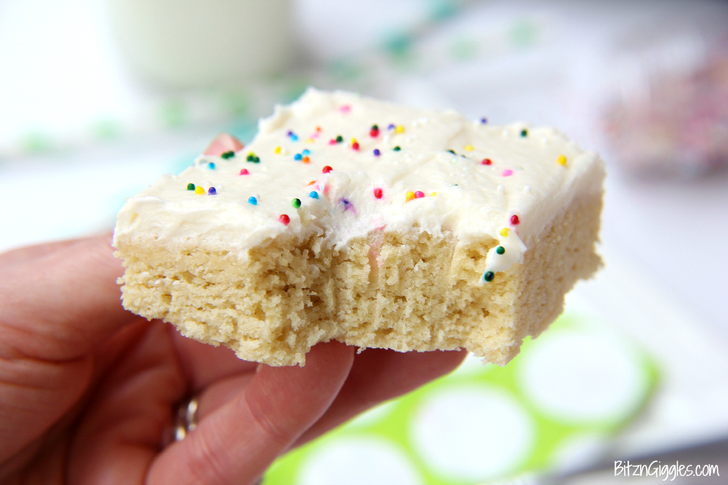 Sugar Cookie Cake Bars - Soft and chewy bars topped with decadent buttercream frosting and colorful sprinkles ~ perfect for a party and makes enough for a crowd!
