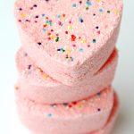 Rainbow Sprinkle Bath Bombs - The sprinkles in these bath bombs burst into color when the bomb hits the bath water and starts to fizz! They smell great, they're fun to make and they're soothing to the skin!