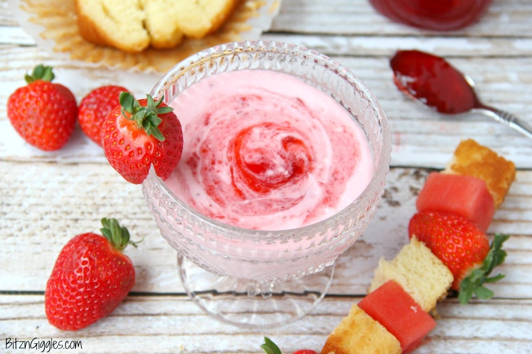 Strawberry Shortcake Dip - This dip comes together in minutes! Swirl in your favorite strawberry jam, cut up some fruit and cake and start dipping!