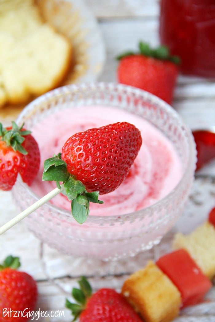 Strawberry Shortcake Dip - This dip comes together in minutes! Swirl in your favorite strawberry jam, cut up some fruit and cake and start dipping!