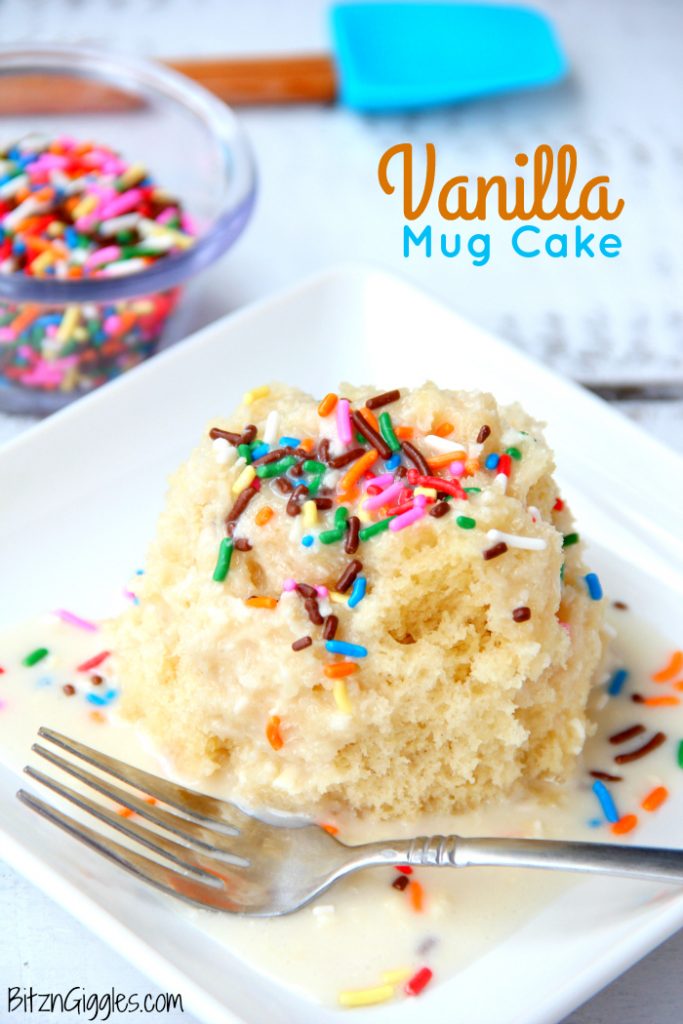 Easy Vanilla Mug Cake - Ready in 90 seconds! This mug cake is moist, delicious and topped with a lovely vanilla icing that soaks into the cake and infuses it with sweetness! #mugcake #vanillacake #recipe #easymugcake #microwavedessert #bitzngiggles