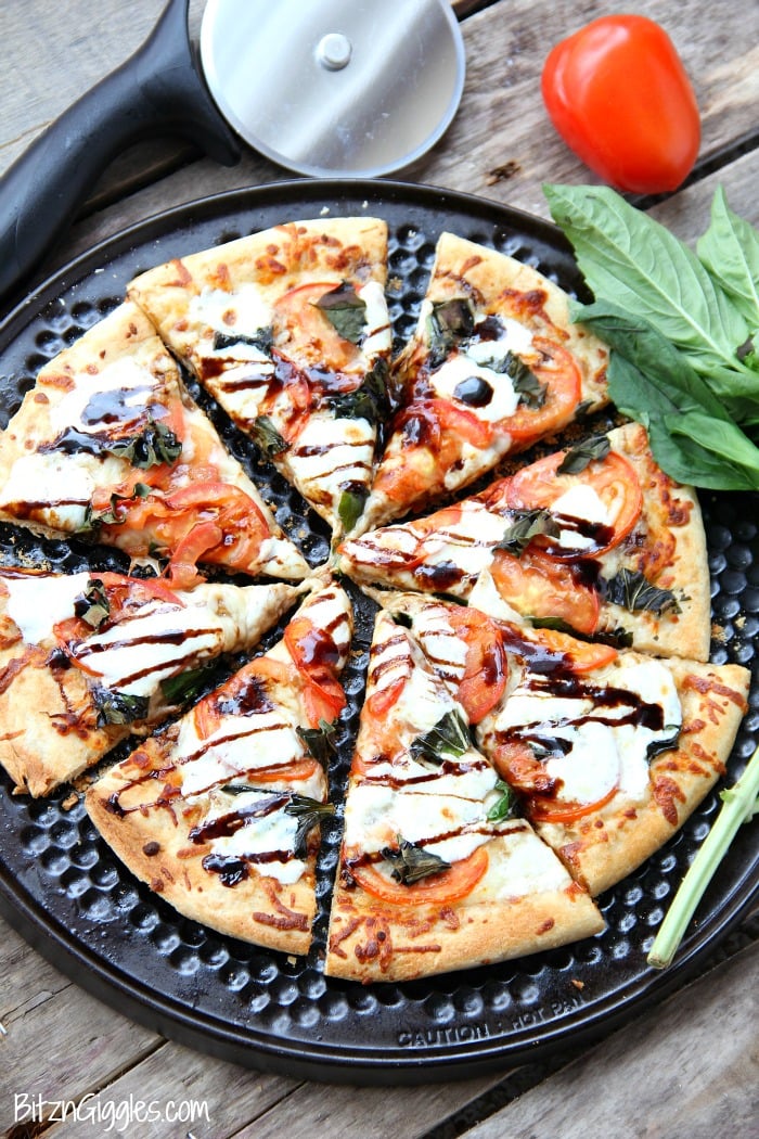 Caprese Pizza - Fresh tomatoes, basil, mozzarella and a sweet balsamic glaze makes this quite possibly the best pizza on the planet!