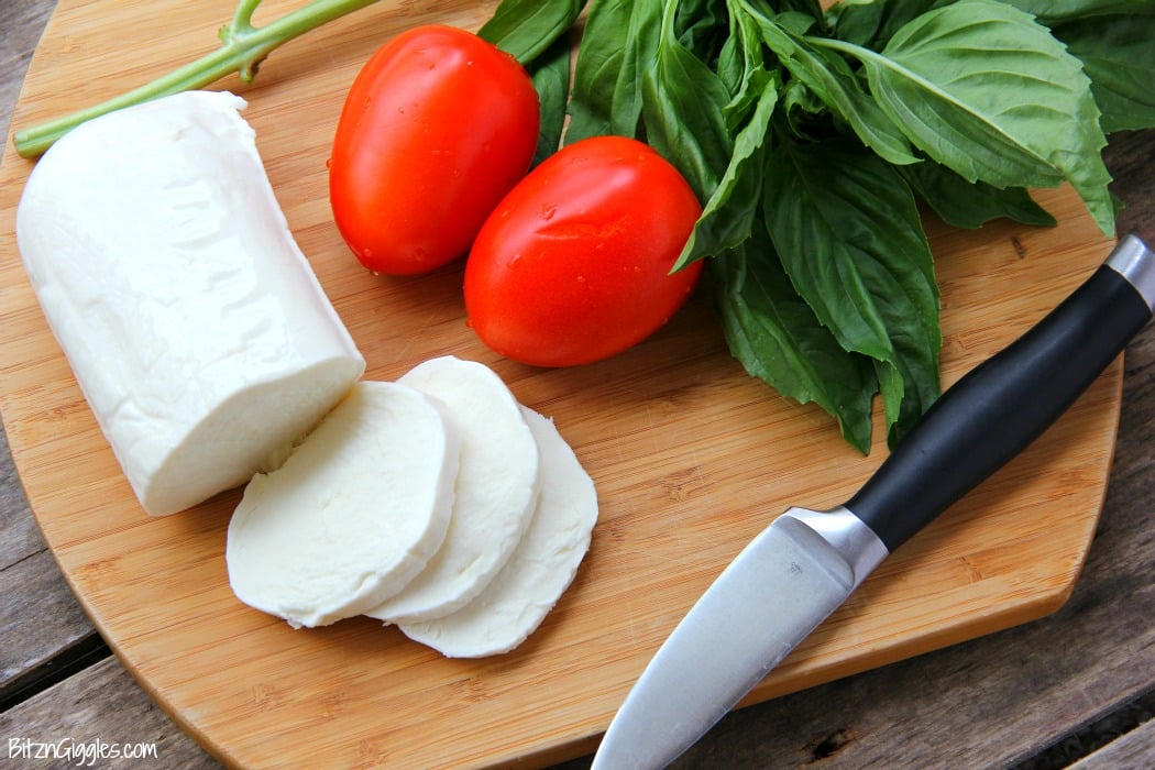 Caprese Pizza - Fresh tomatoes, basil, mozzarella and a sweet balsamic glaze makes this quite possibly the best pizza on the planet!