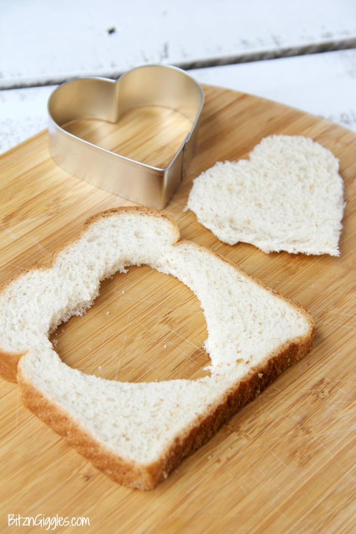 Easy Egg in a Hole - Such a fun way to enjoy eggs and toast! Make it extra special by using a heart-shaped cookie cutter!