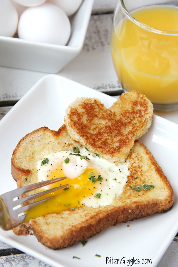 Easy Egg in a Hole - Such a fun way to enjoy eggs and toast! Make it extra special by using a heart-shaped cookie cutter!