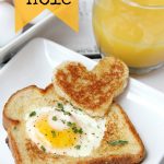 Easy Egg in a Hole - Such a fun way to enjoy eggs and toast! Make it extra special by using a heart-shaped cookie cutter!
