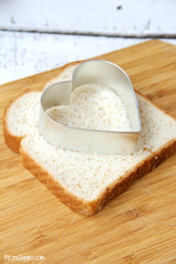 Easy Egg in a Hole - Such a fun way to enjoy eggs and toast! Make it extra special by using a heart-shaped cookie cutter!