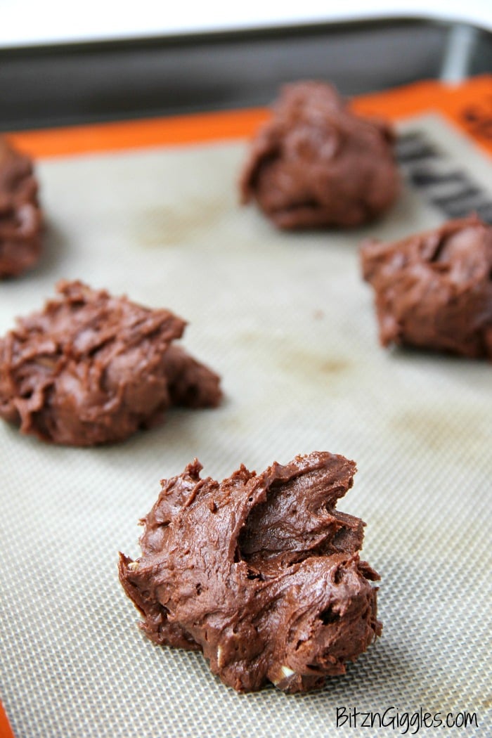 Soft and chewy chocolate fudge cookies with bits of melted Andes Mints sprinkled throughout.