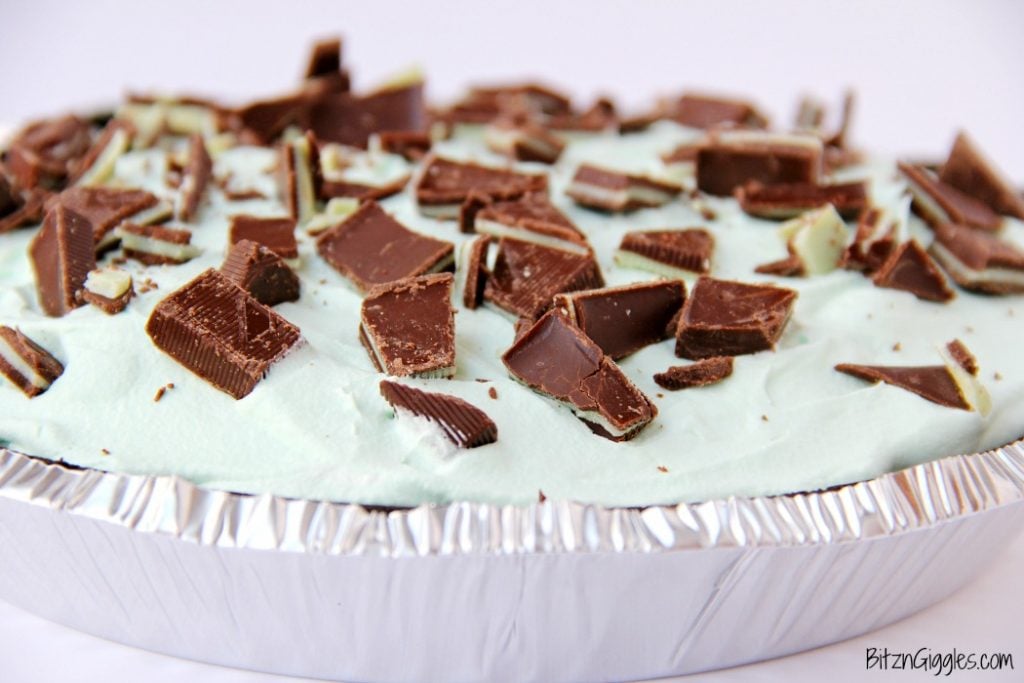 Easy Grasshopper Pie - Kid-friendly chocolate and Andes mint pie recipe! Uses a store-bought Oreo crust so it comes together in literally minutes!