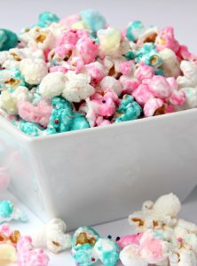 Cotton Candy Popcorn - Candy coated popcorn recipe with sprinkles and real cotton candy pieces!