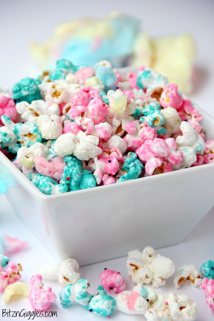 Cotton Candy Popcorn - Candy coated popcorn recipe with sprinkles and real cotton candy pieces!