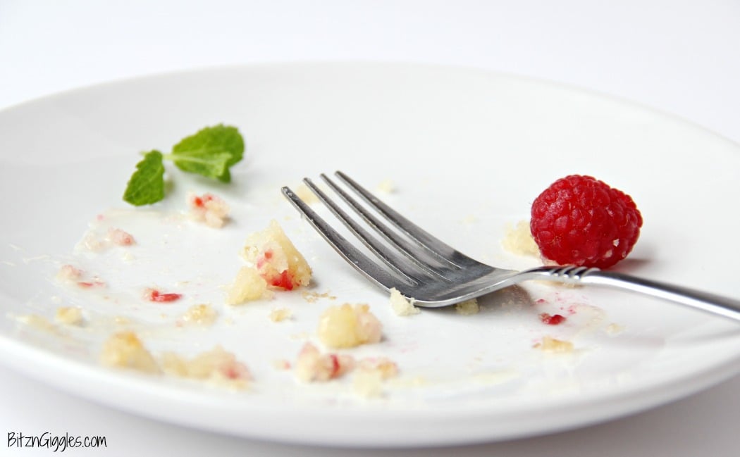 Warm Raspberry Cake with Vanilla Glaze - just like your mom used to make! A delicious cake with fresh raspberries baked in and topped with a sweet vanilla glaze!