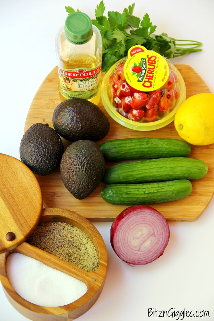 Avocado Salad - A healthy and colorful salad featuring avocado, tomato, cucumber, basil and a splash of lemon!