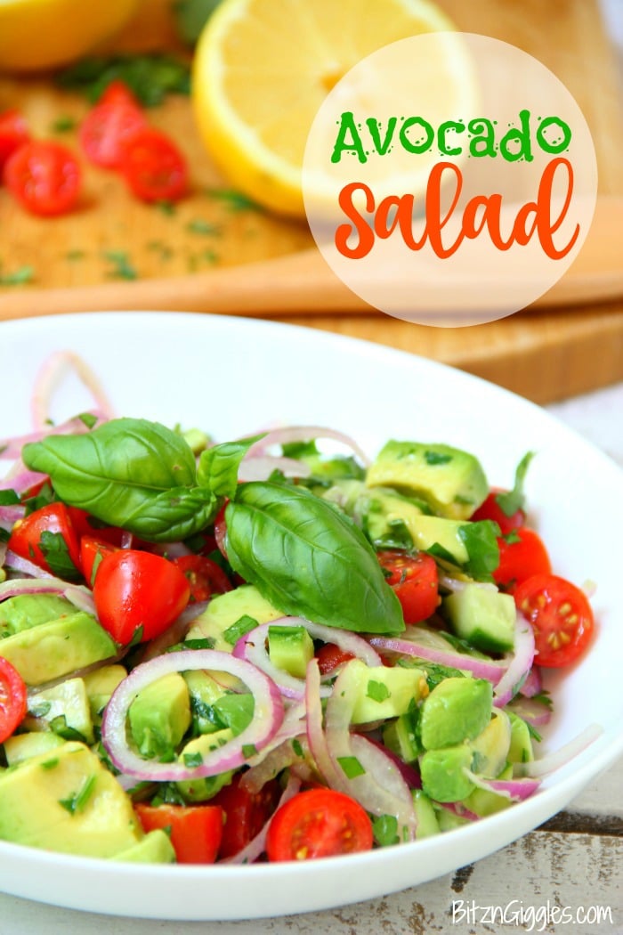 Avocado Salad - A healthy and colorful salad featuring avocado, tomato, cucumber, basil and a splash of lemon!