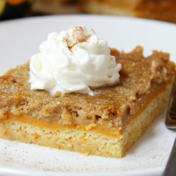 Pumpkin Pie Cake Bars - Three-layer pumpkin bars that come together with a cake mix! Cake batter crust, creamy pumpkin center and a cinnamon sugar crumble topping!