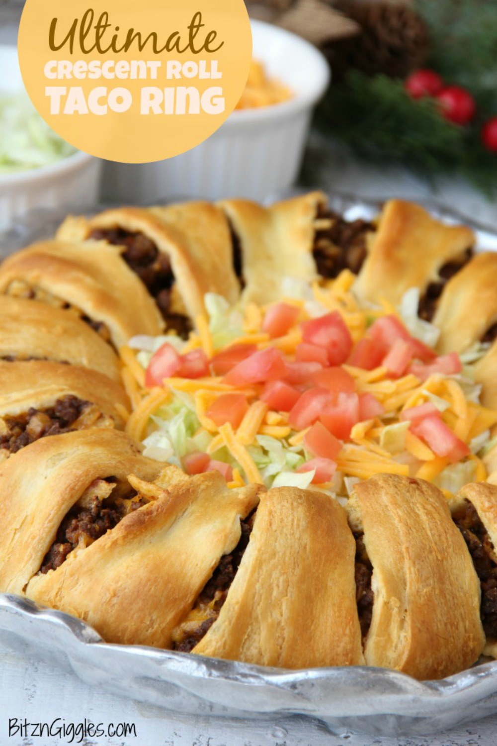 Ultimate Crescent Roll Taco Ring - This isn't just any old taco ring, it's filled with corn chips, guacamole, sour cream, cheese and tomatoes - easy and delicious, ready to serve a crowd! 