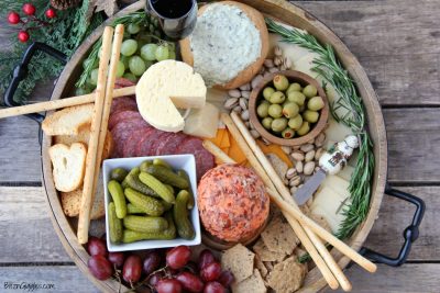 How to Assemble a Charcuterie Board - Step-by-step instructions on how to make your own charcuterie board! This is such a easy and stunning idea for a party!