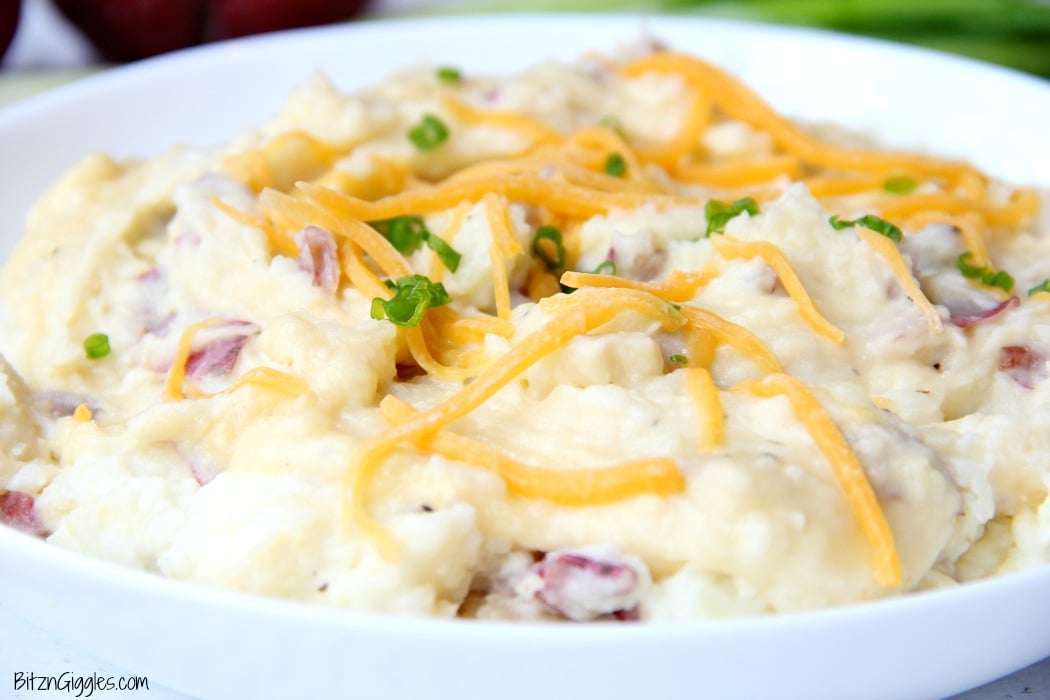 Twice Baked Red Potato Casserole - Flavorful mashed potatoes you bake right in the oven!! Perfect for a crowd!